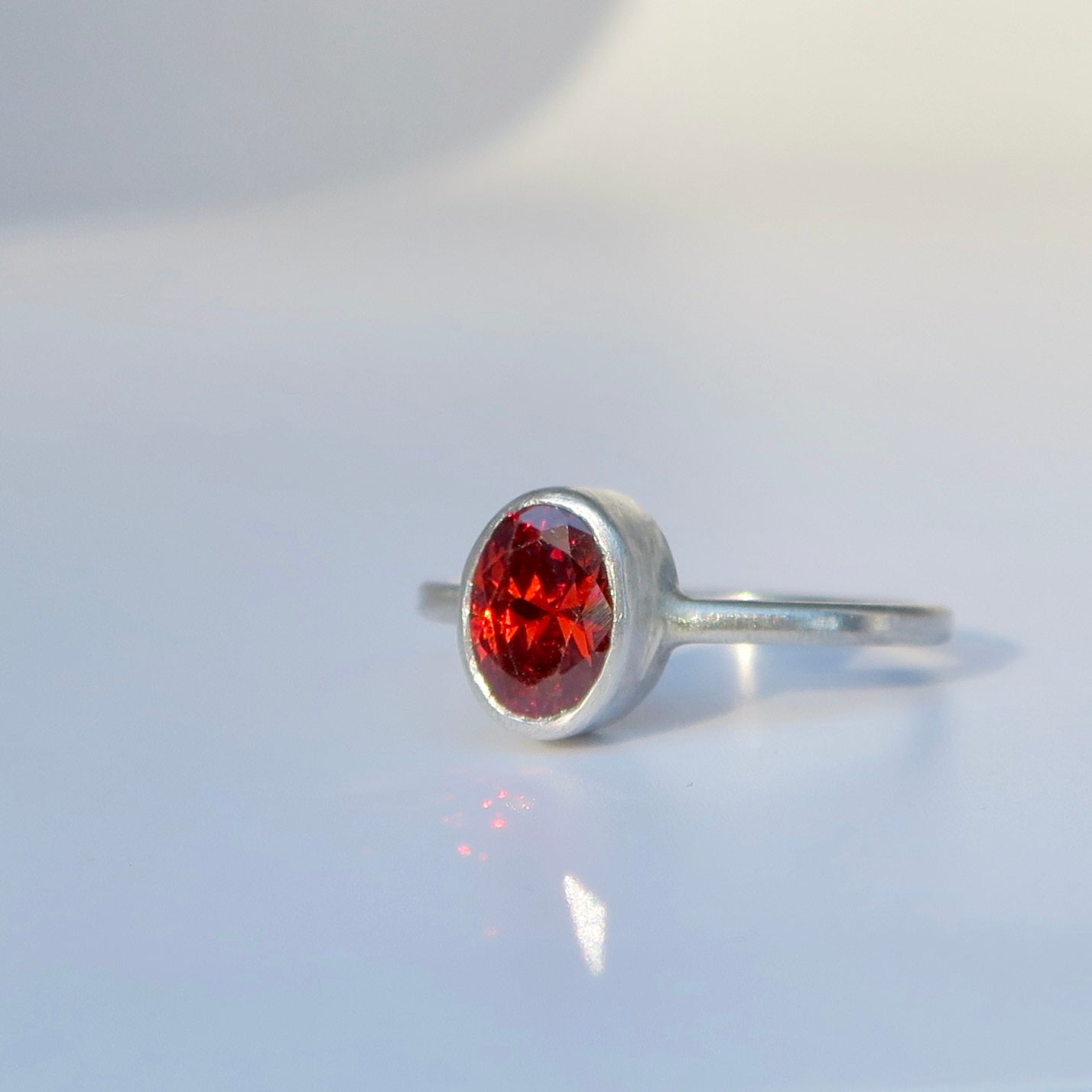 Garnet Coloured Silver Ring