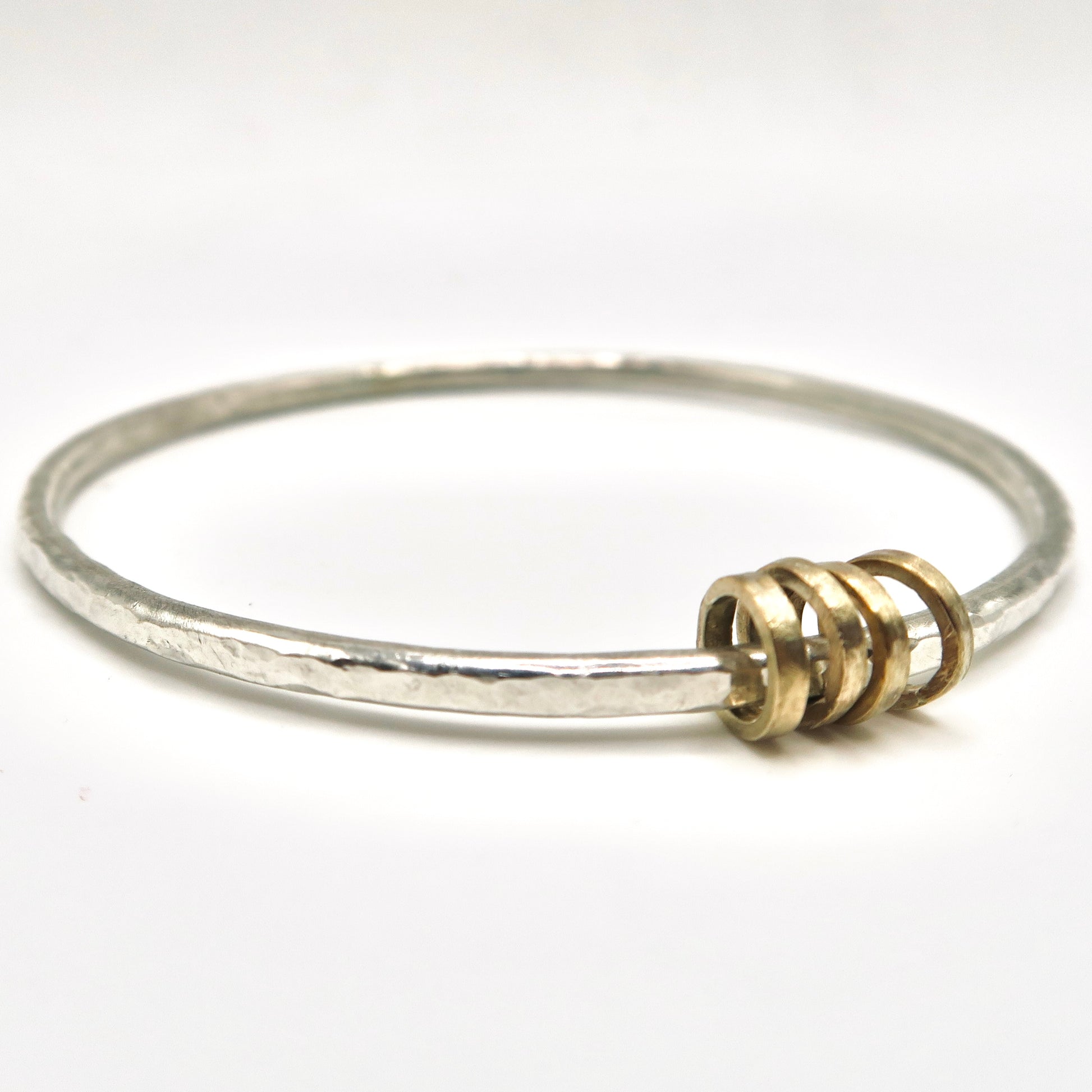 gold and silver fidget bangle