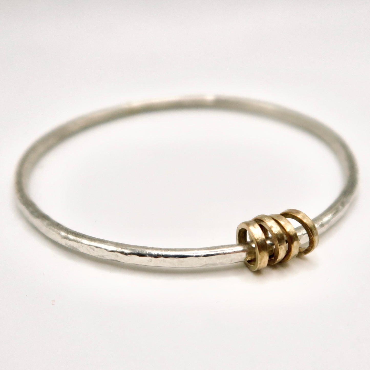 gold and silver fidget bangle