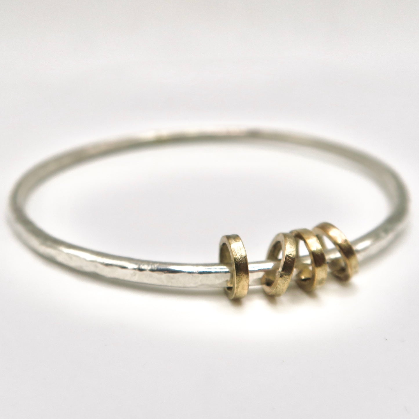 gold and silver fidget bangle